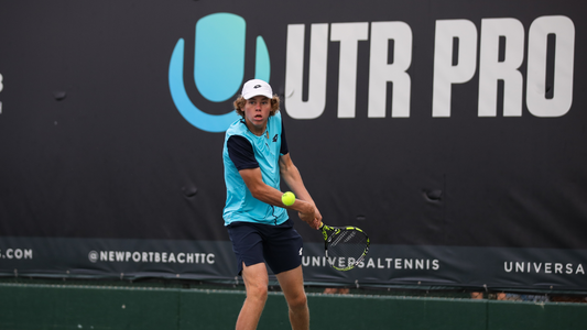 Alex Michelsen hits a backhand at a UTR Pro Tennis Tour event in Newport Beach, California