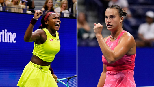Two women fist pump at the US Open